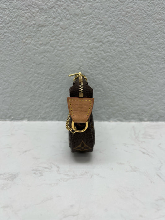 Louis Vuitton - Mini Pochette Accessoires - Monogram coated canvas with natural cowhide leather trim - Brown - (mini)