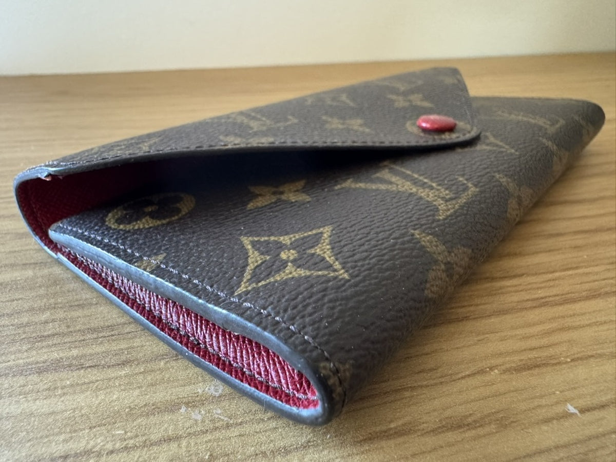 Louis Vuitton - Portefeuille Emilie - Monogram coated canvas exterior, grained leather interior - Monogram Brown with Red accents - (medium)