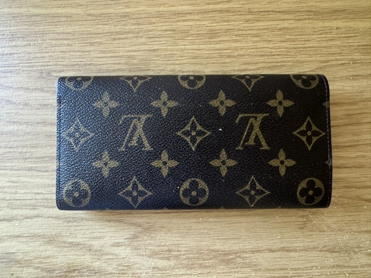 Louis Vuitton - Portefeuille Emilie - Monogram coated canvas exterior, grained leather interior - Monogram Brown with Red accents - (medium)