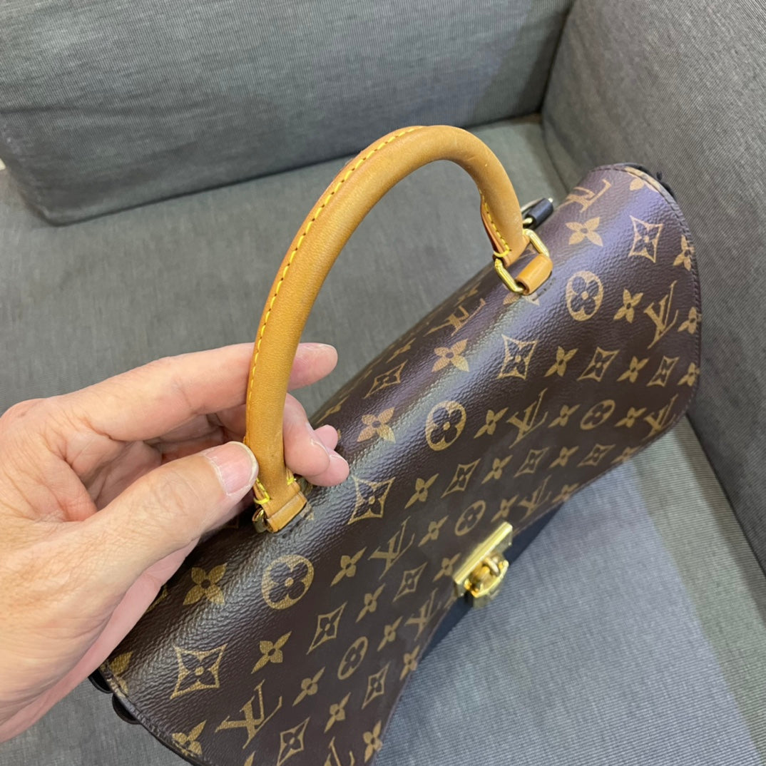 Louis Vuitton - Marignan - Monogram coated canvas with grained leather trim and Vachetta leather accents - Brown Monogram with Black - (medium)