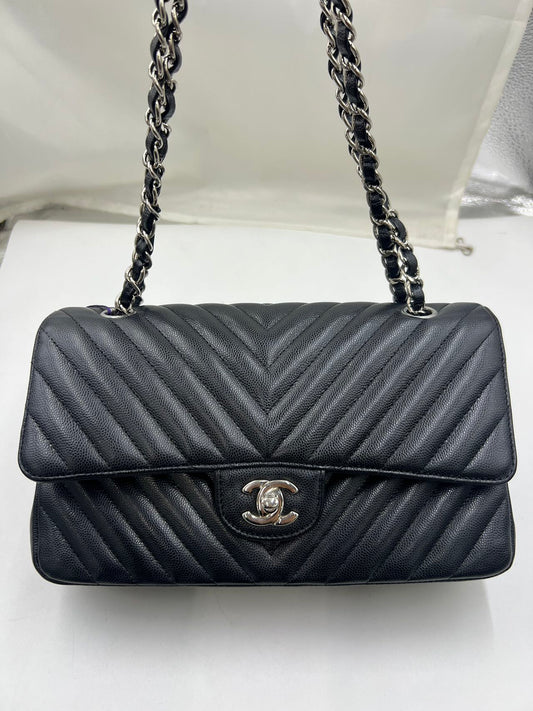 Chanel - Classic Flap Bag - Caviar leather - Black - (Medium)