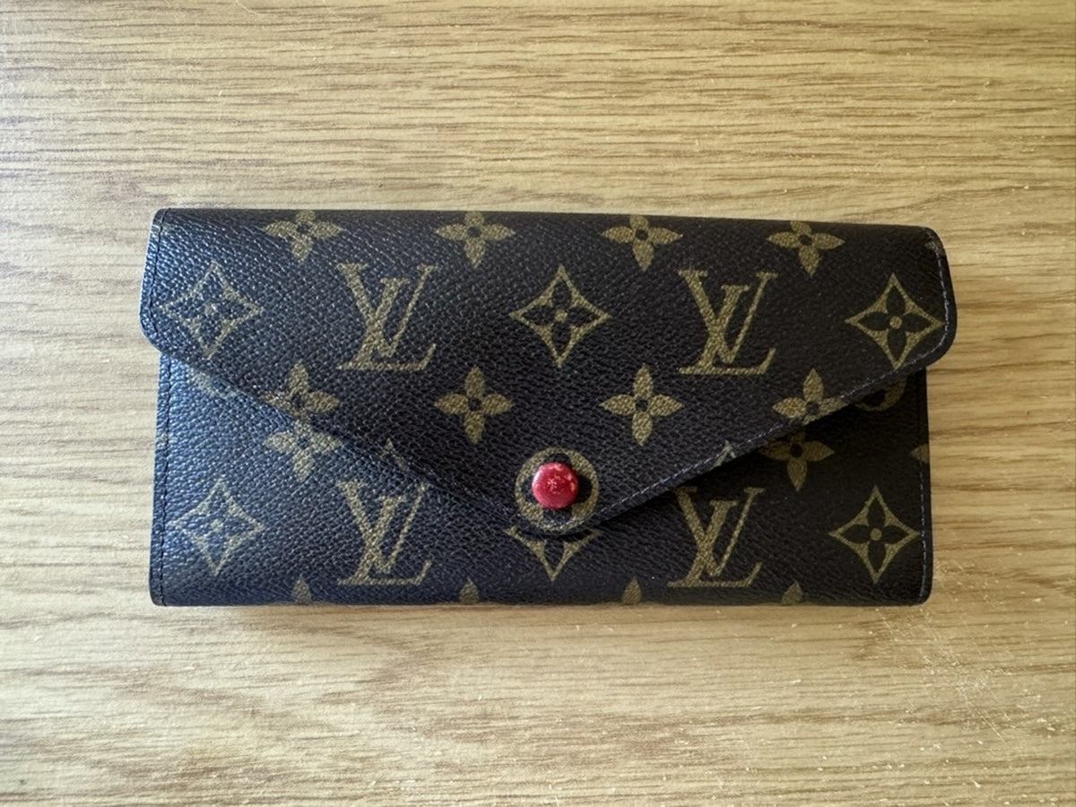 Louis Vuitton - Portefeuille Emilie - Monogram coated canvas exterior, grained leather interior - Monogram Brown with Red accents - (medium)