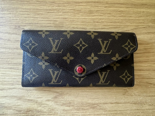 Louis Vuitton - Portefeuille Emilie - Monogram coated canvas exterior, grained leather interior - Monogram Brown with Red accents - (medium)