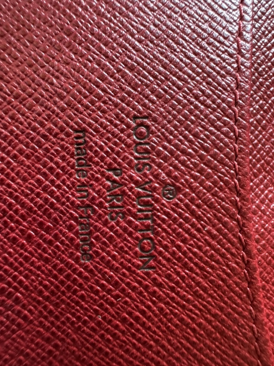 Louis Vuitton - Portefeuille Emilie - Monogram coated canvas exterior, grained leather interior - Monogram Brown with Red accents - (medium)