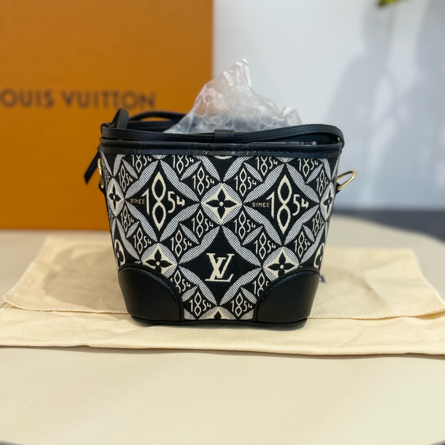 Louis Vuitton - Since 1854 Mini Bucket Bag - Jacquard canvas with leather trim - Black - (mini)
