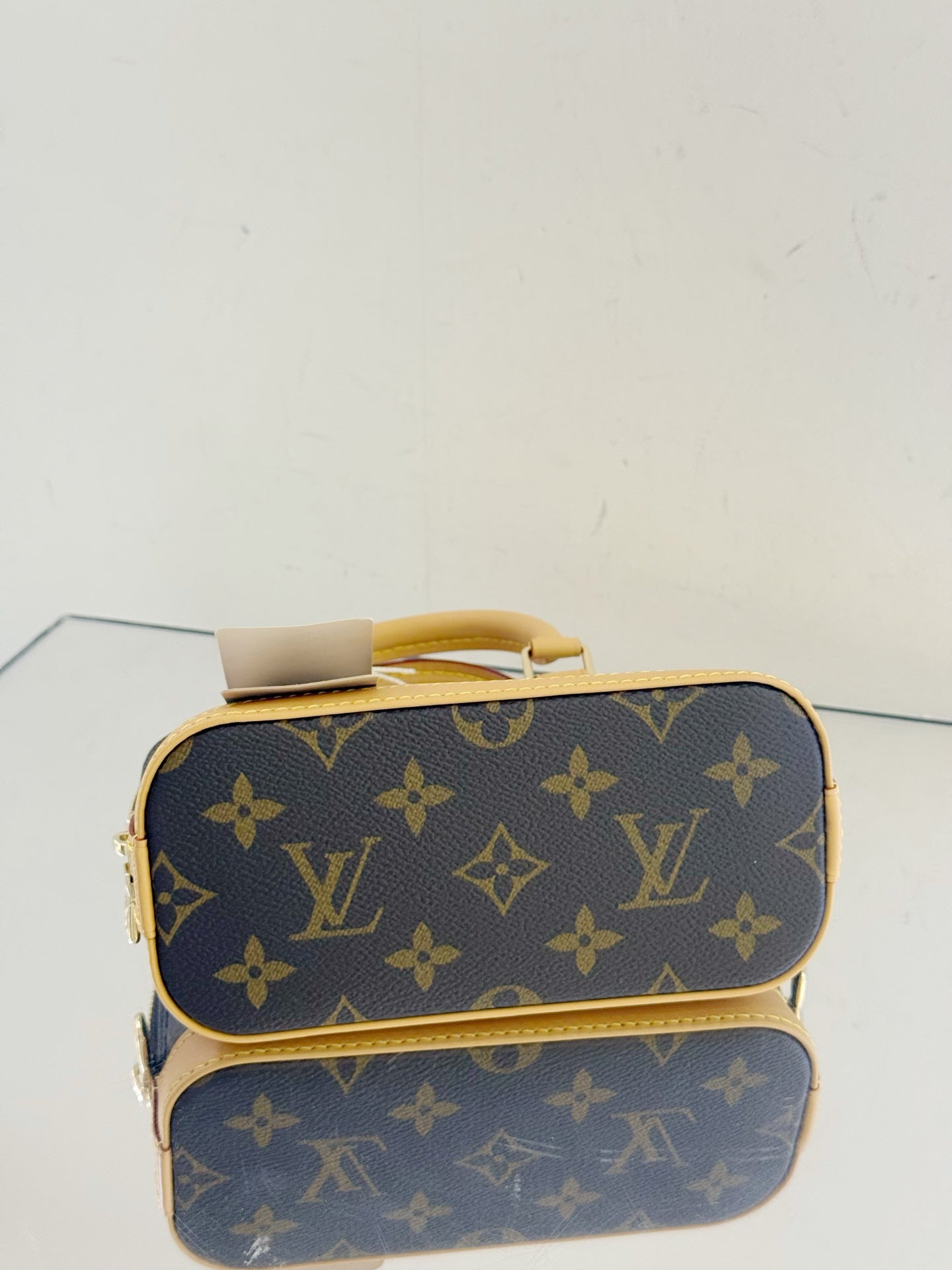 Louis Vuitton - Alma Nano - Monogram coated canvas with Vachetta leather trim - Brown - (mini)
