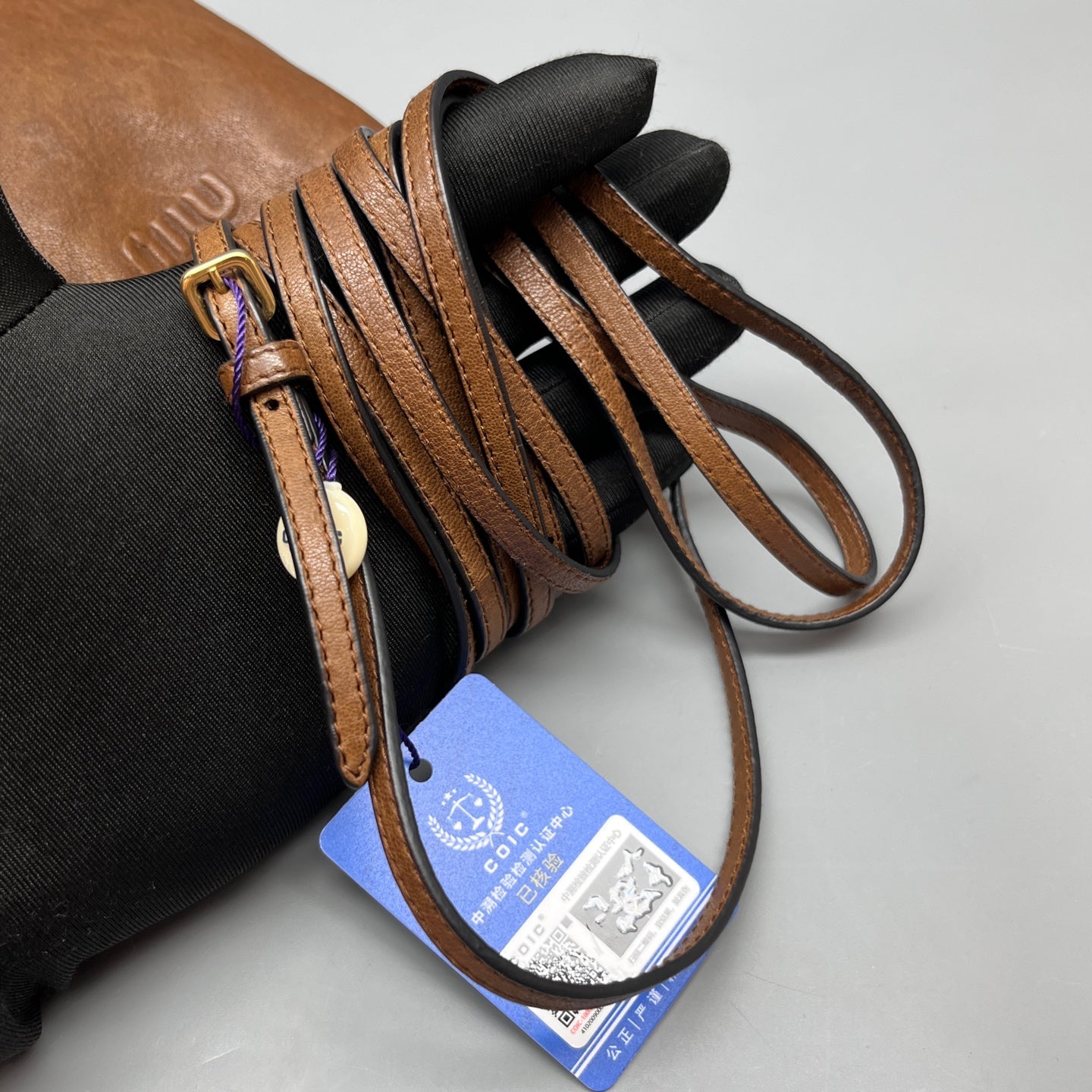 Miu Miu - Drawstring Mini Bucket Bag - Grained leather - Brown - (mini)