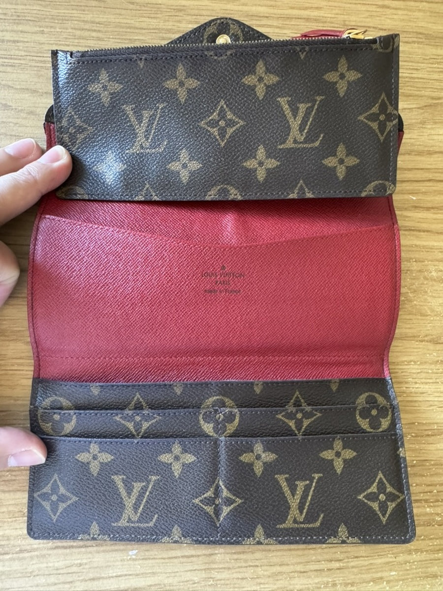 Louis Vuitton - Portefeuille Emilie - Monogram coated canvas exterior, grained leather interior - Monogram Brown with Red accents - (medium)