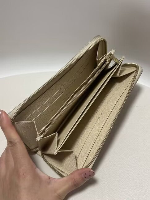 Louis Vuitton | Wallets | Zippy