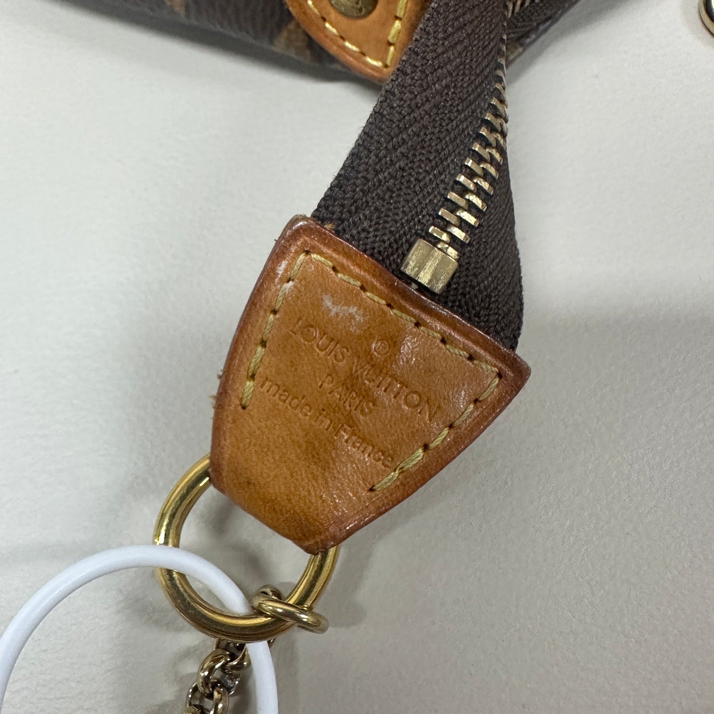 Louis Vuitton - Pochette Accessoires - Monogram coated canvas with Vachetta leather trim - Brown - (mini)