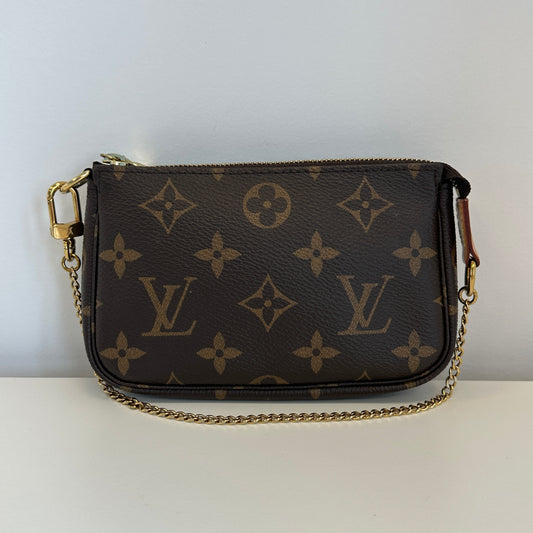 Louis Vuitton - Mini Pochette Accessoires - Monogram coated canvas with vachetta leather trim - Brown - (mini)