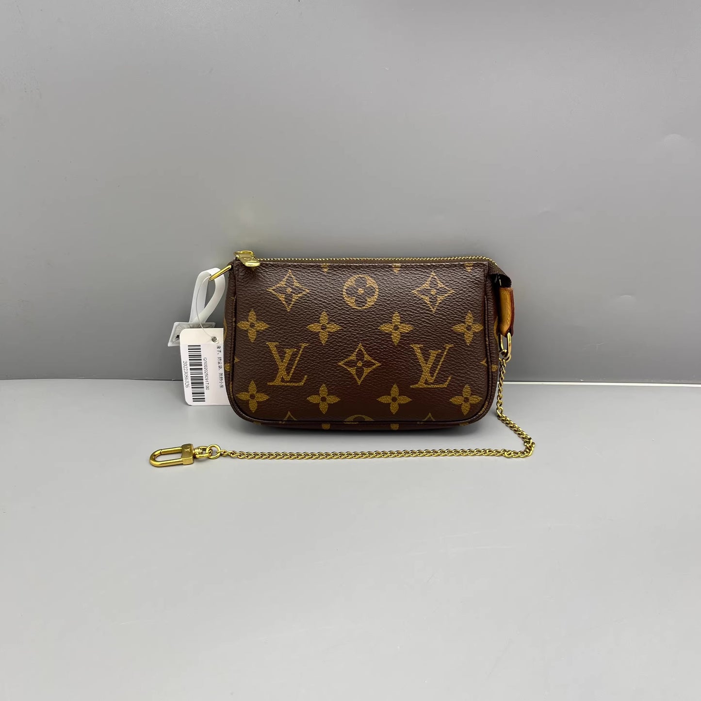 Louis Vuitton - Mini Pochette Accessoires - Monogram coated canvas with Vachetta leather trim - Brown - (mini)