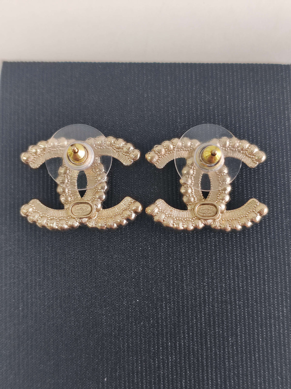 Chanel - Other - Gold-tone base metal with black and clear rhinestone embellishments. - Gold