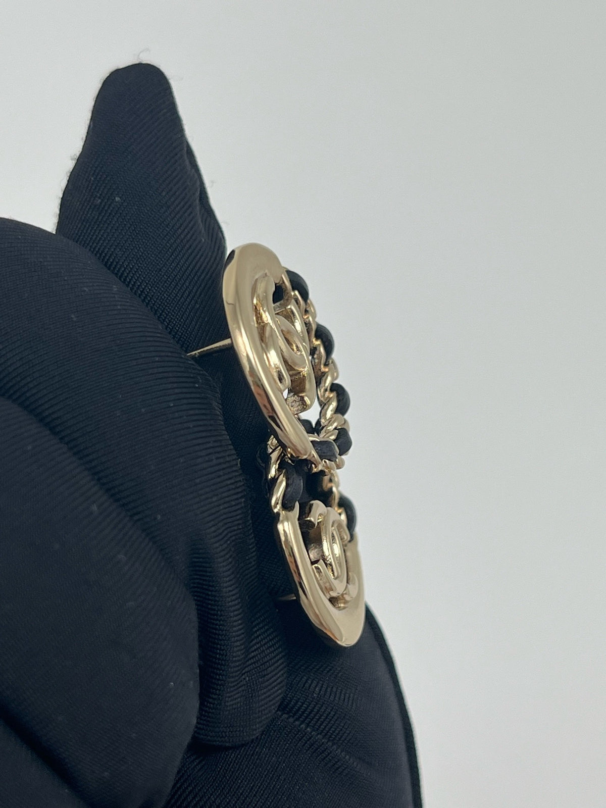 Chanel - Other - Gold-tone base metal with black leather interwoven through the chain links. - Multicolour