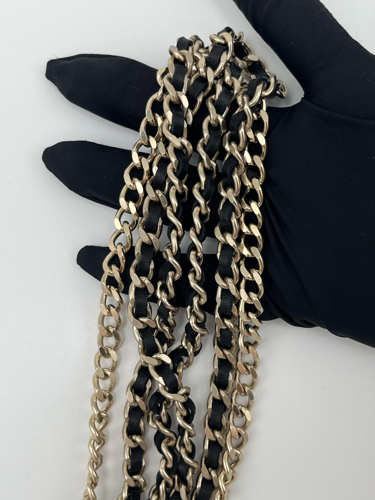 Chanel - Other - Gold-tone metal chain with black leather woven through it. - Multicolour - (Mid-length)