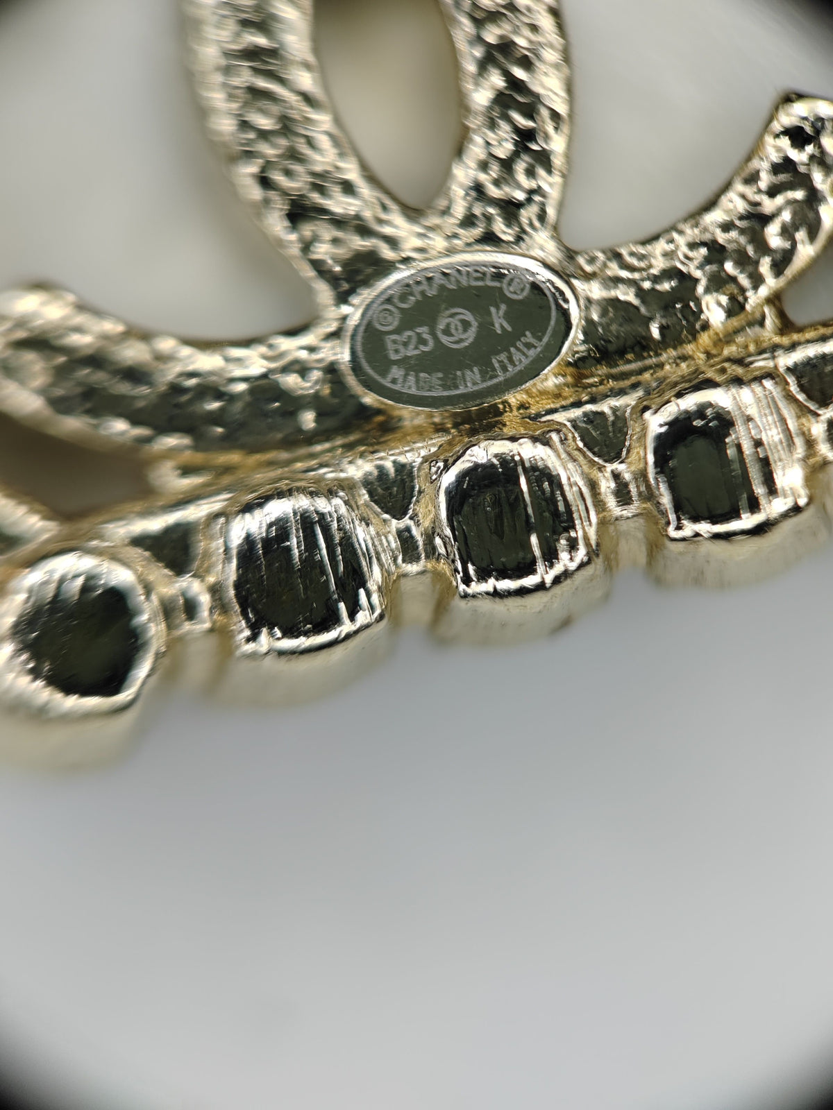 Chanel - Other - Gold-tone metal with clear glass rhinestone embellishments; exact alloy unspecified. - Gold