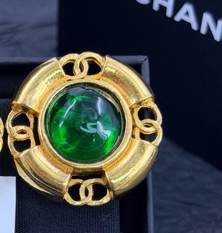 Chanel - Other - Gold-tone metal with green glass cabochons. - Multicolour