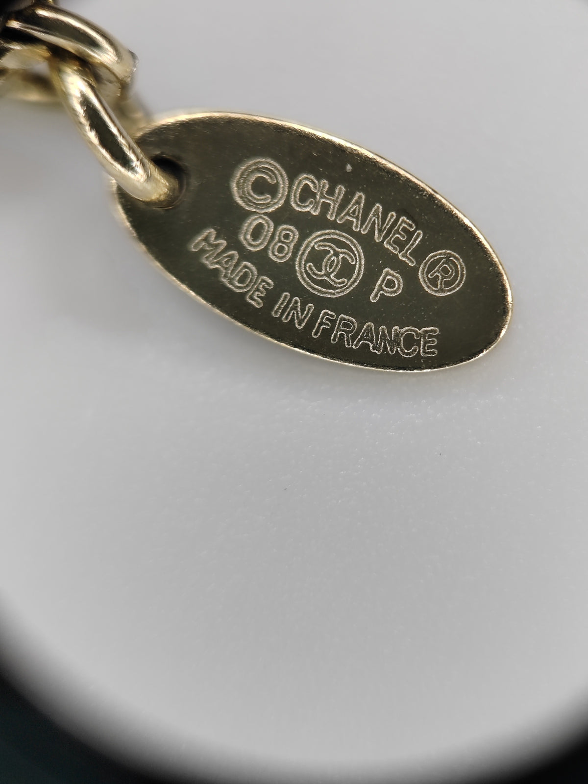 Chanel - Other - Gold-tone metal with multicolour cabochon-style elements and clear faceted accents; exact stone materials are unconfirmed. - Multicolour
