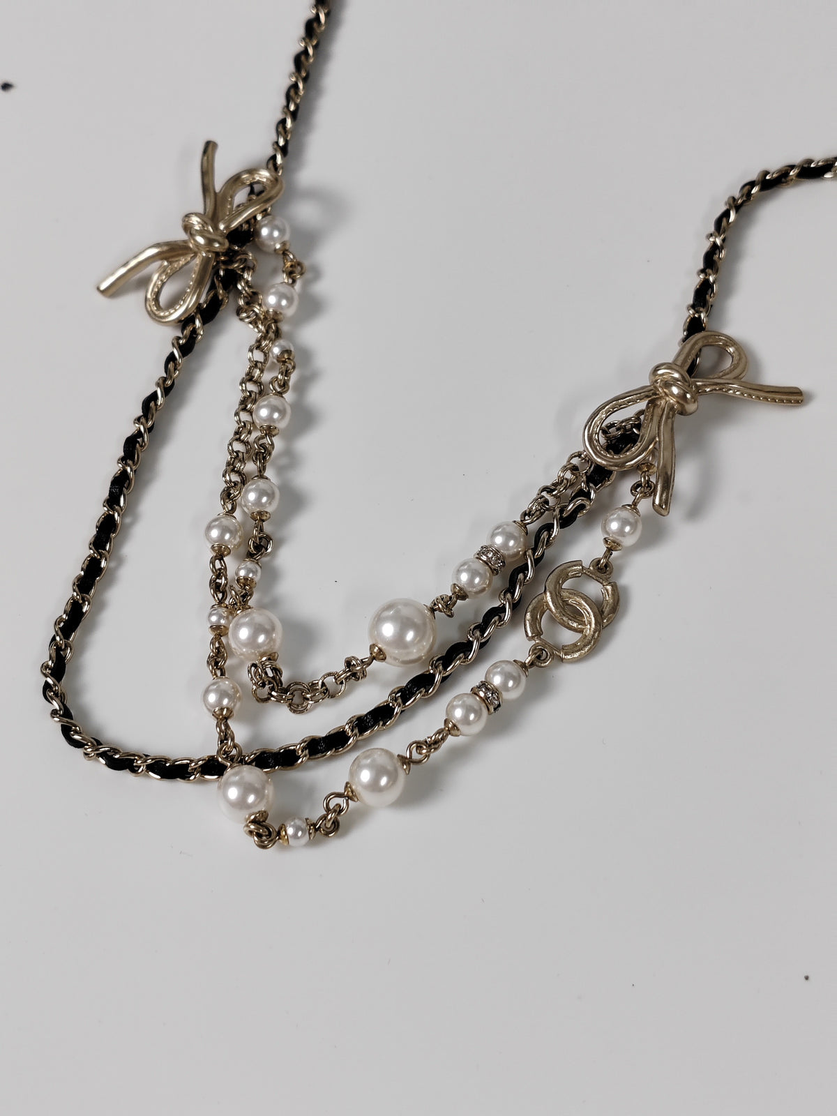Chanel - Other - Gold-tone metal with pearl accents and black leather. - Multicolour