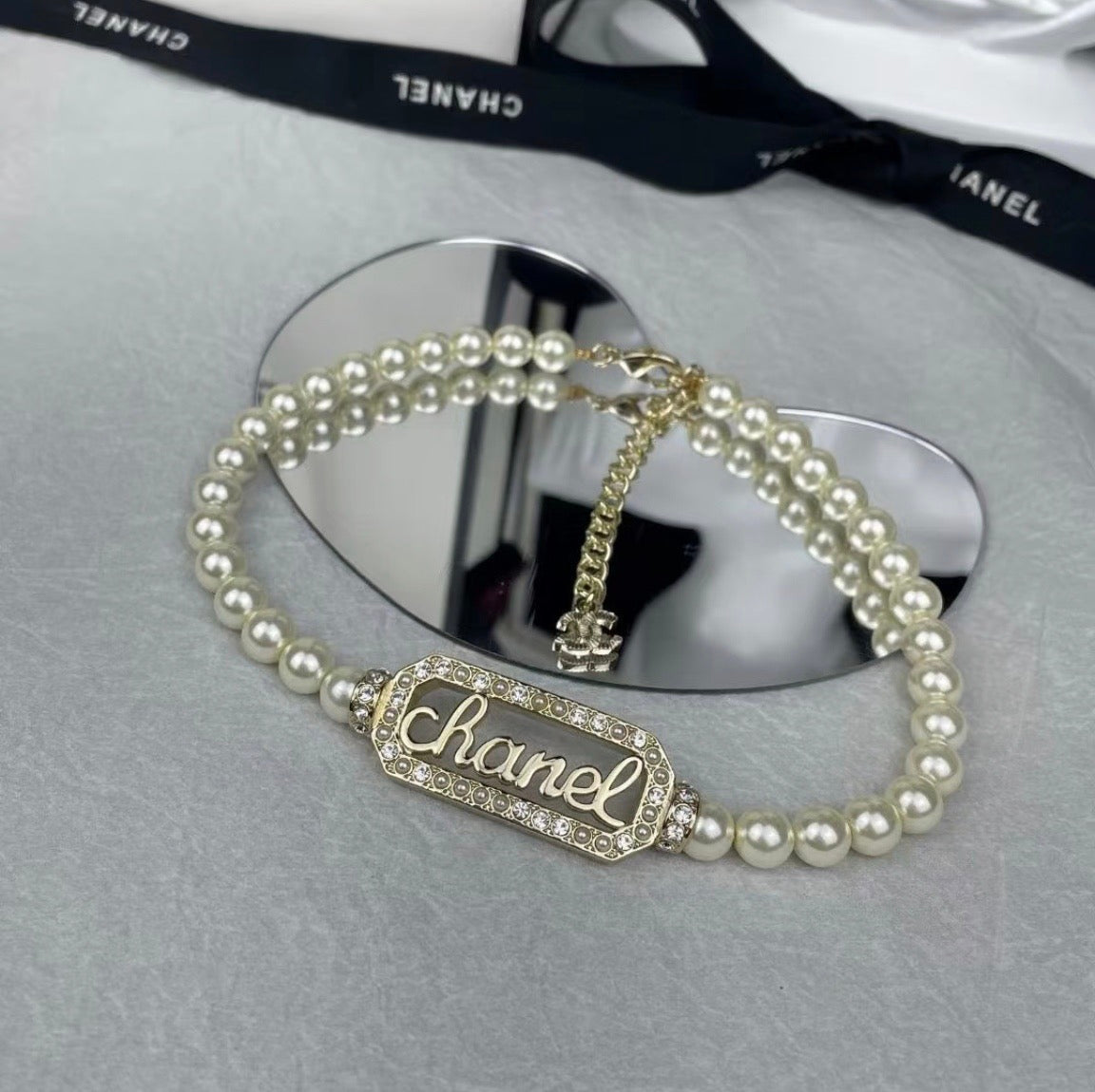 Chanel - Other - Gold-tone metal with pearl-like beads and crystal embellishments. - White