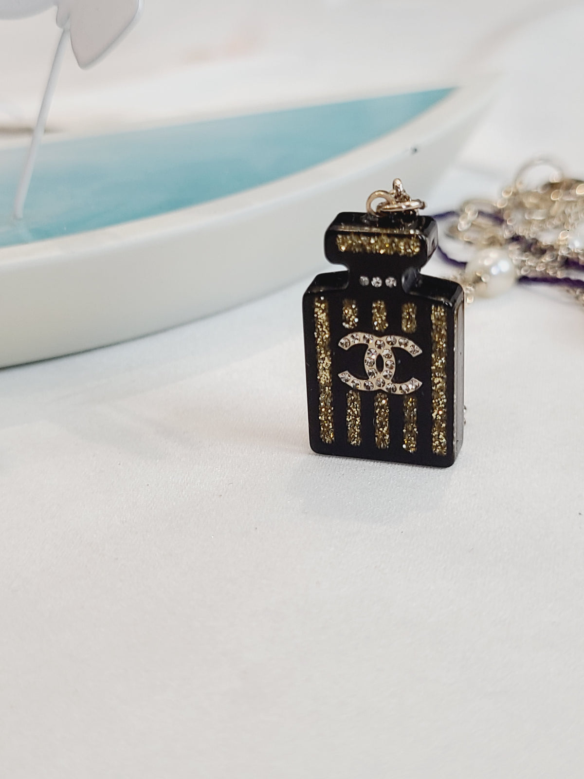 Chanel - Other - Gold-tone metal with rhinestone embellishments and imitation pearls. - Multicolour