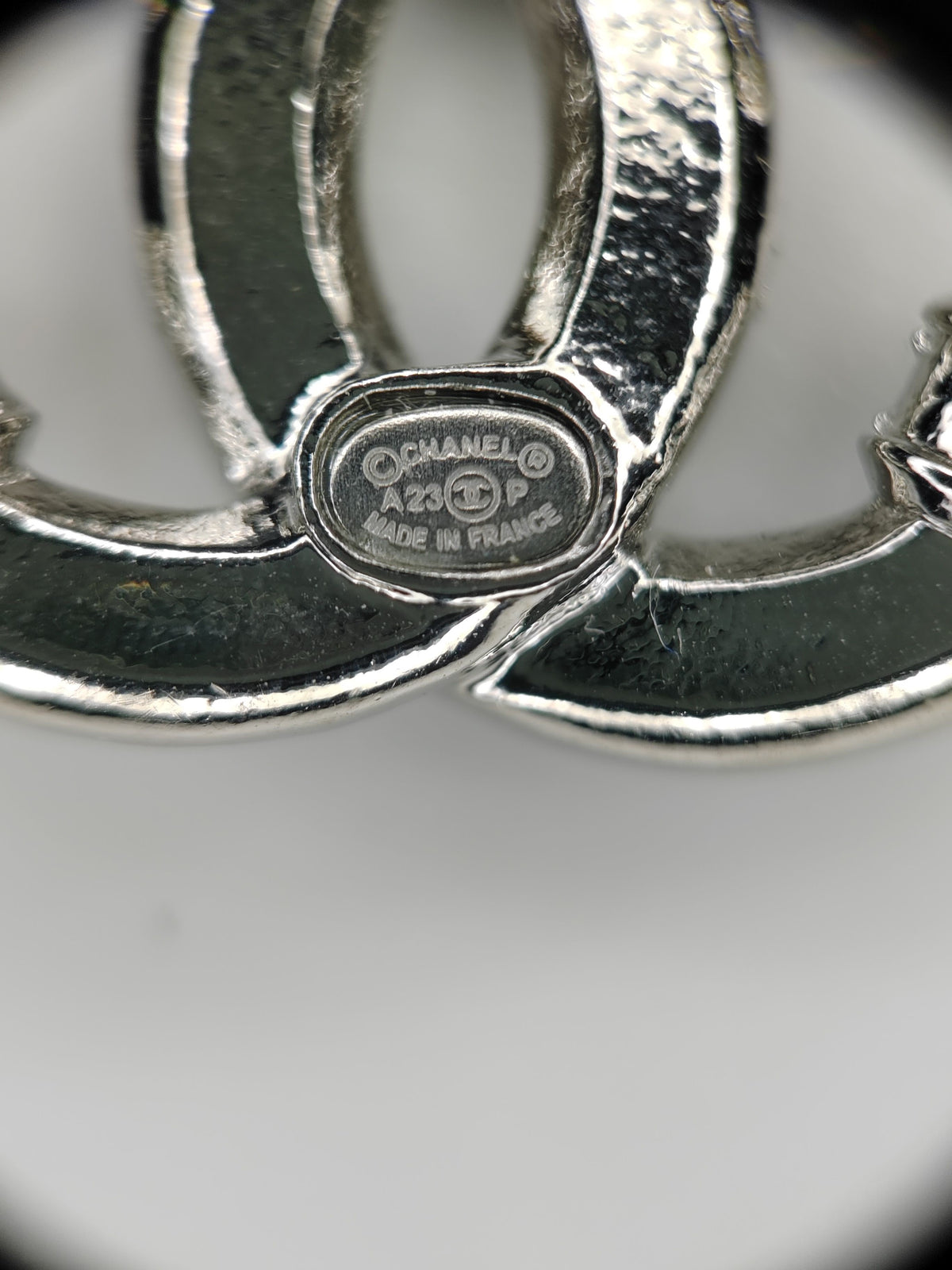 Chanel - Other - Silver-tone base metal with clear glass crystal embellishments. - Silver