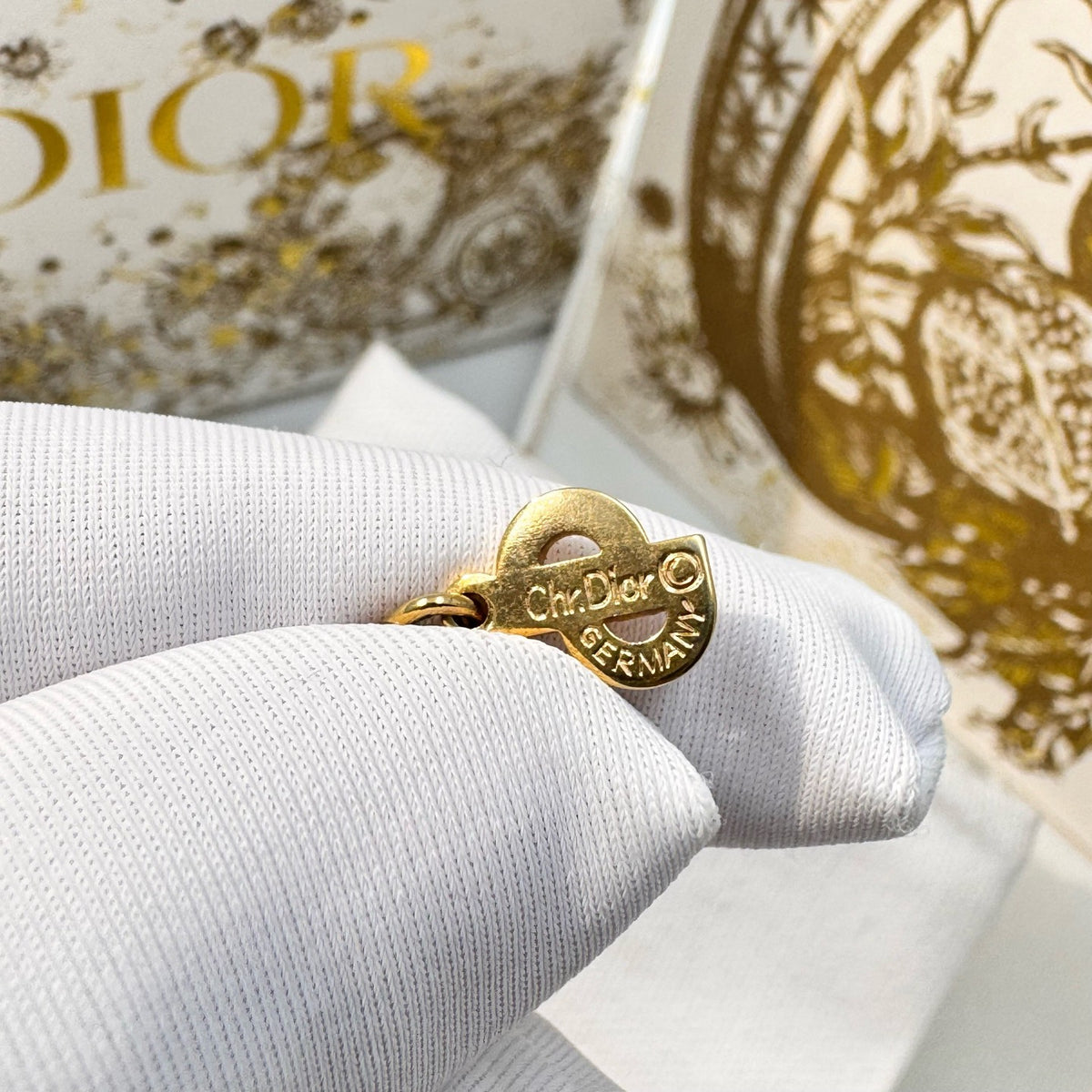 Dior - Other - Gold-tone metal with green and clear stones; stone composition unconfirmed. - Multicolour