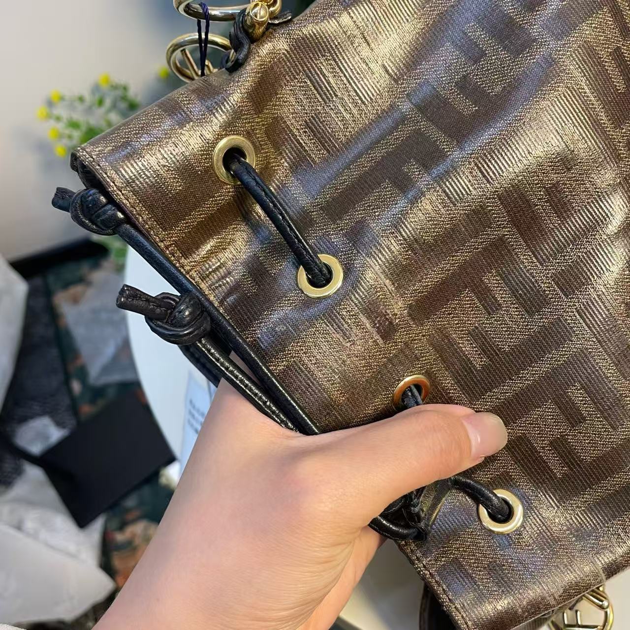 Fendi - Mon Tresor Bucket Bag - Coated canvas with leather trim - Brown with black accents and gold-tone hardware - (small)