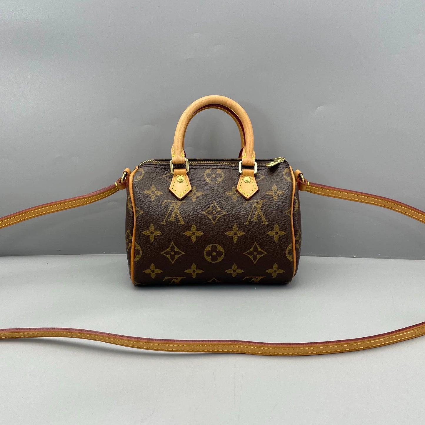 Louis Vuitton - Speedy Nano - Monogram coated canvas with natural Vachetta leather trim - Brown - (mini)