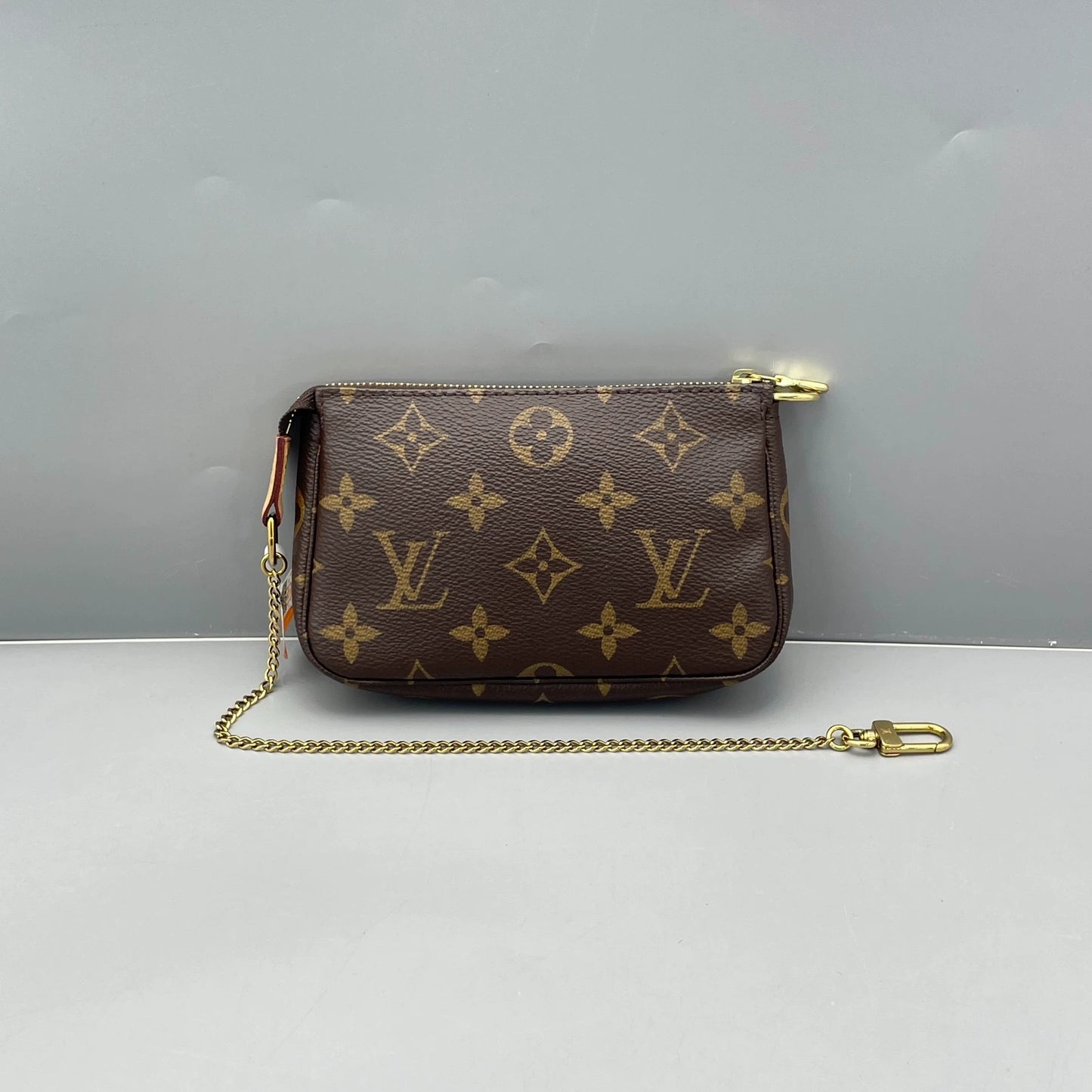 Louis Vuitton - Mini Pochette Accessoires - Monogram coated canvas with natural cowhide leather trim - Brown - (mini)