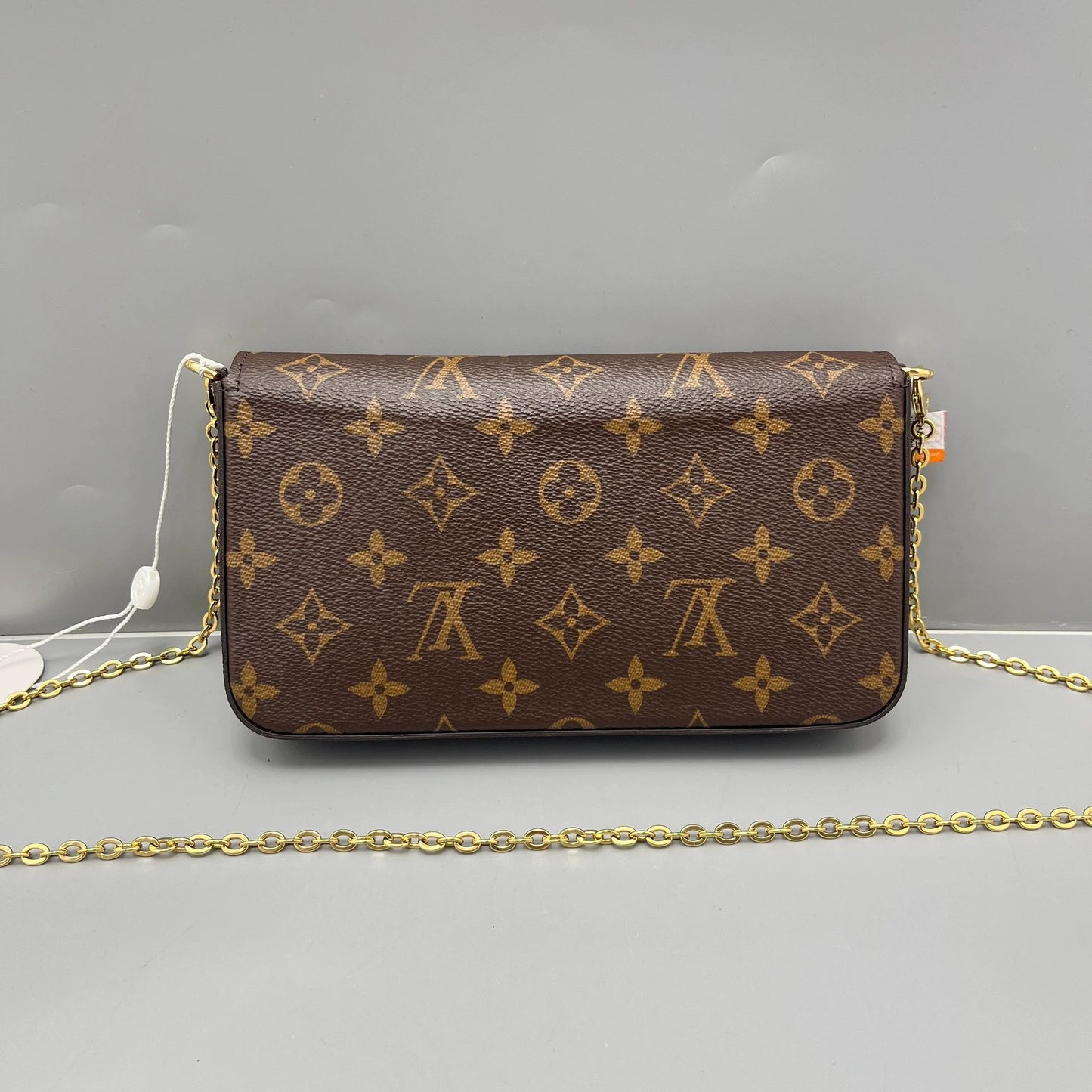 Louis Vuitton - Pochette Felicie - Monogram coated canvas with grained leather trim and interior elements - Brown - (small)