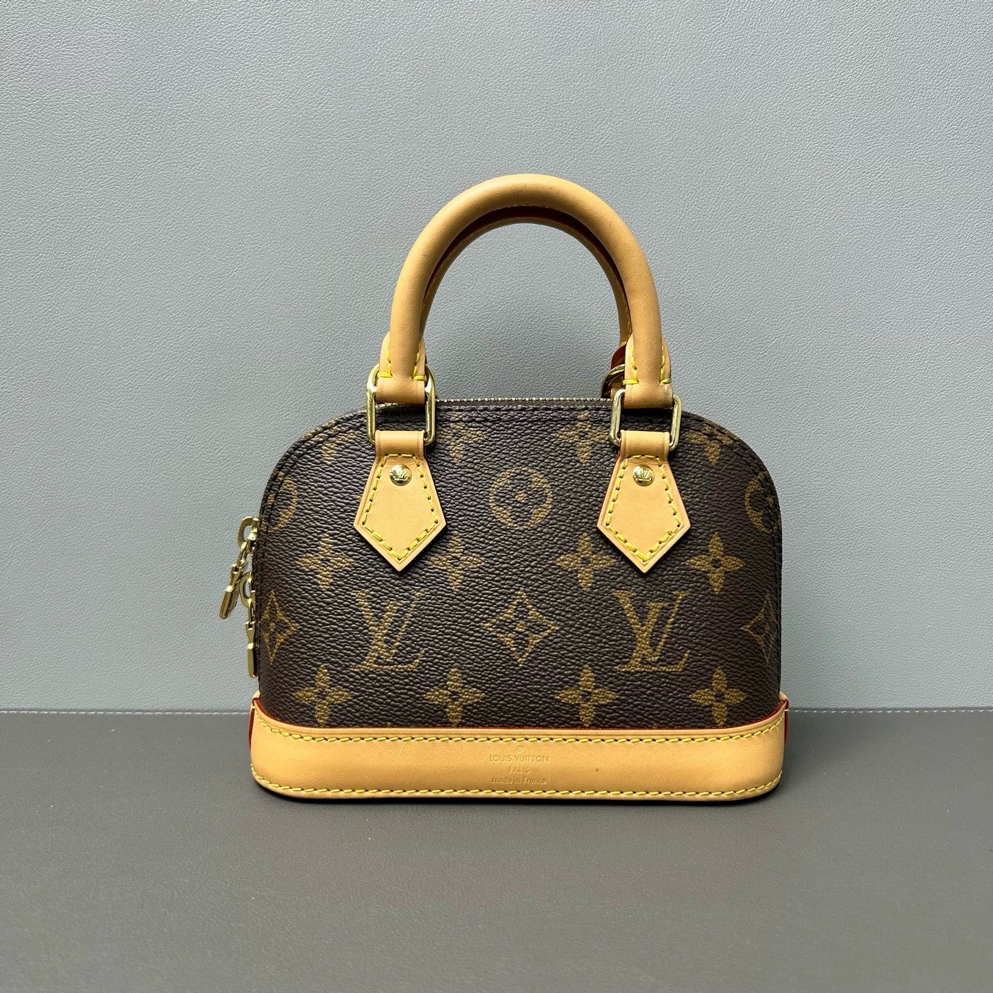 Louis Vuitton - Nano Alma - Monogram coated canvas with natural cowhide leather trim - Brown - (mini)