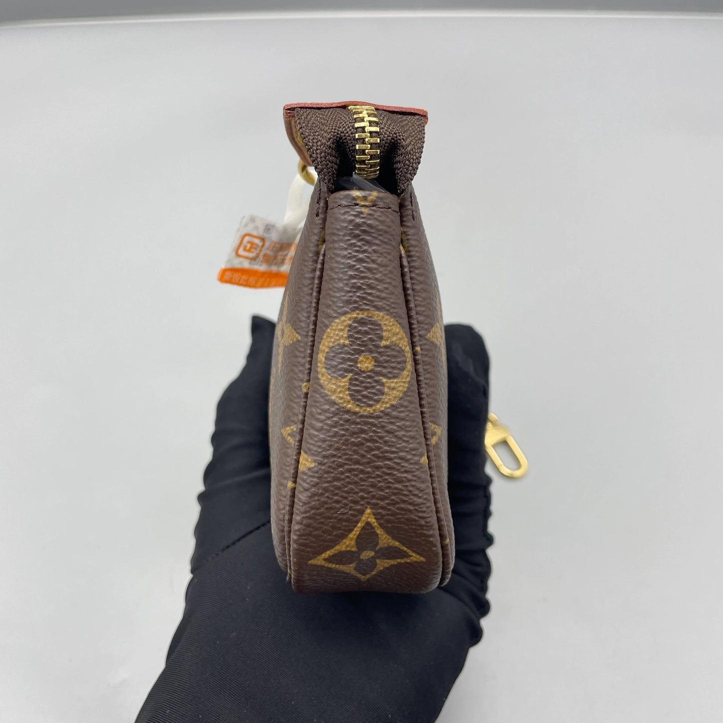 Louis Vuitton - Mini Pochette Accessoires - Monogram coated canvas with natural cowhide leather trim - Brown - (mini)