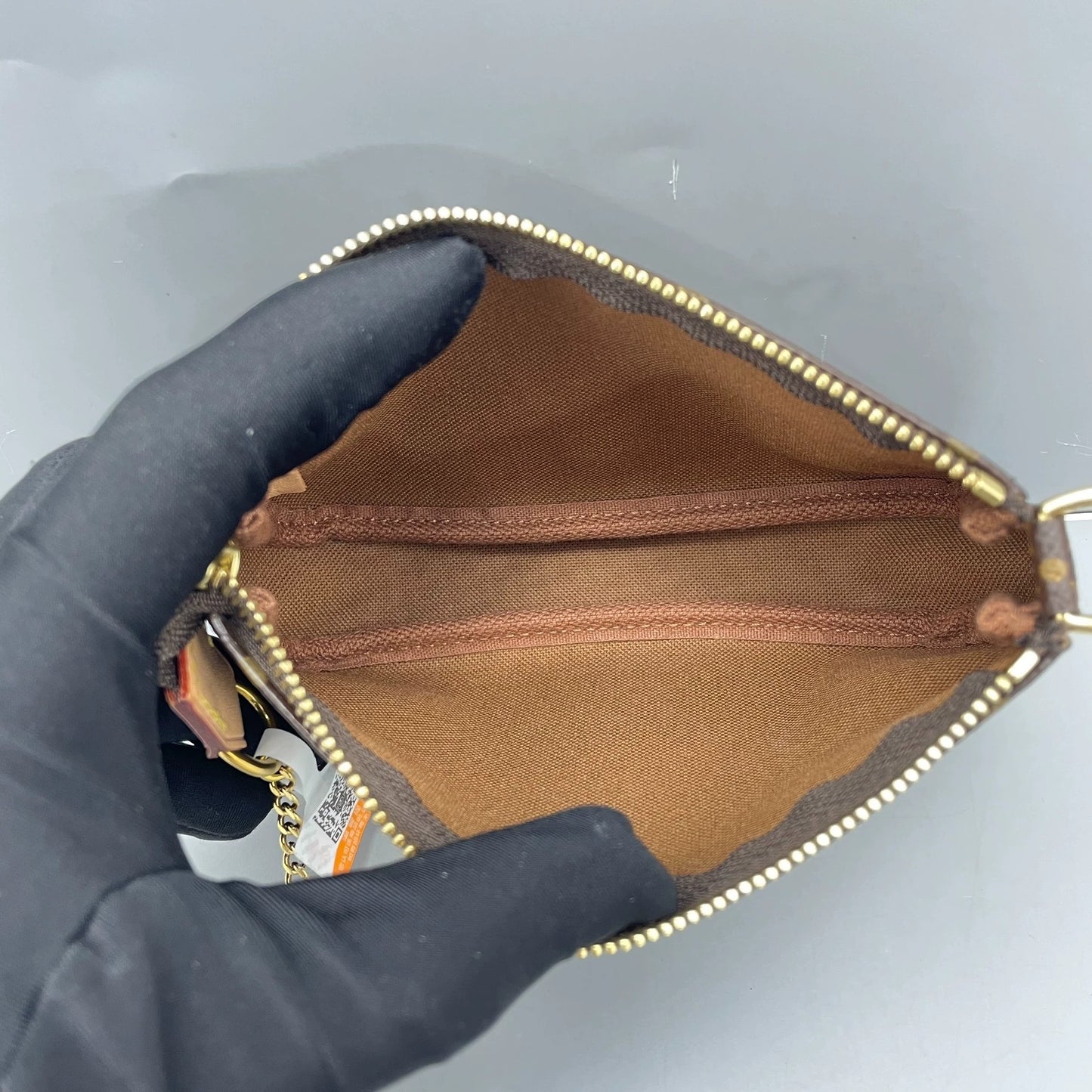 Louis Vuitton - Mini Pochette Accessoires - Monogram coated canvas with natural cowhide leather trim - Brown - (mini)
