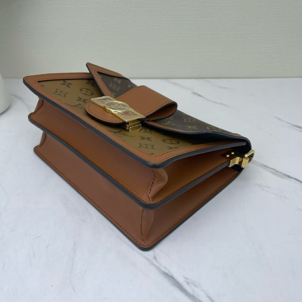 Louis Vuitton - Dauphine - Monogram coated canvas with calfskin leather trim - Brown - (medium)