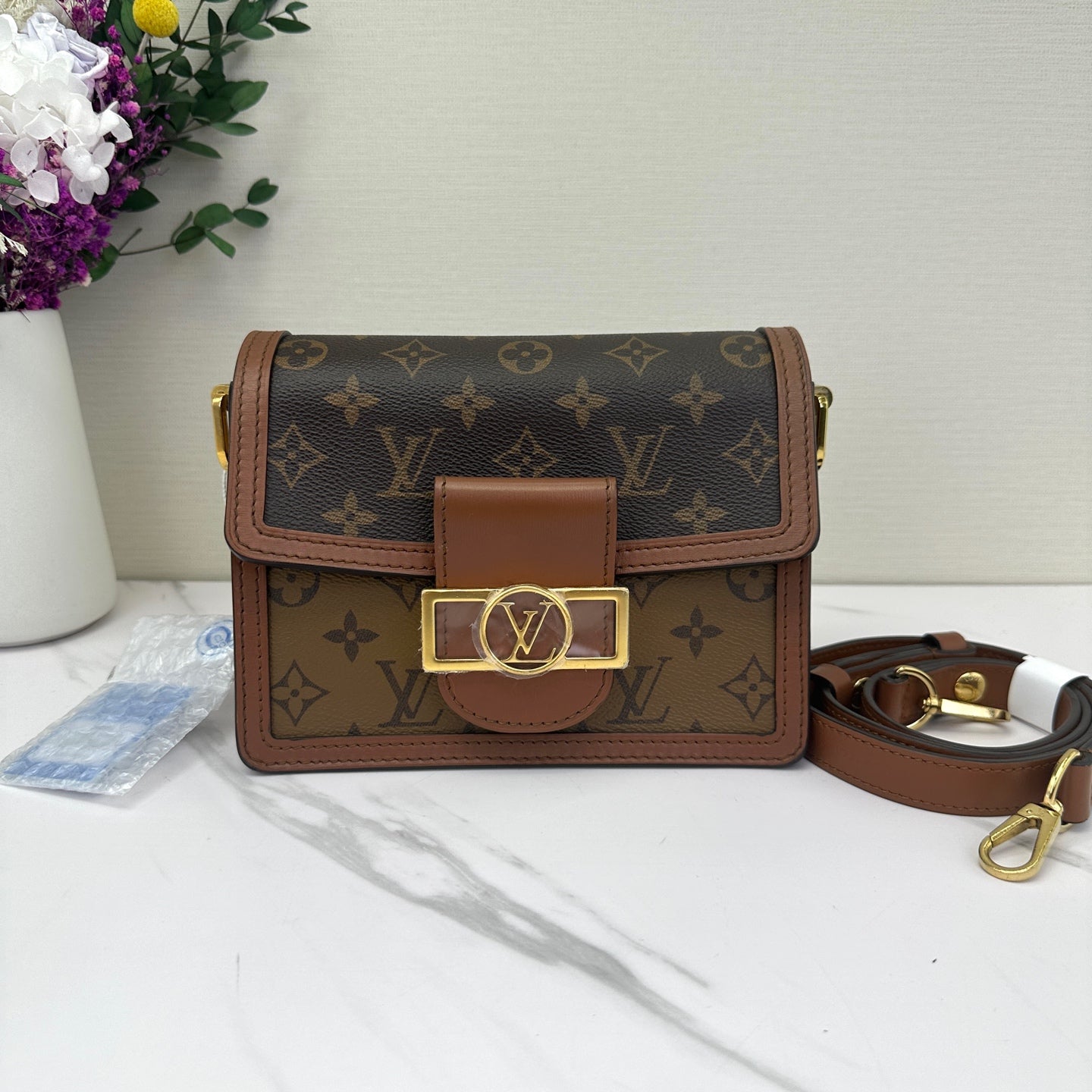 Louis Vuitton - Dauphine - Monogram coated canvas with leather trim - Brown - (small)