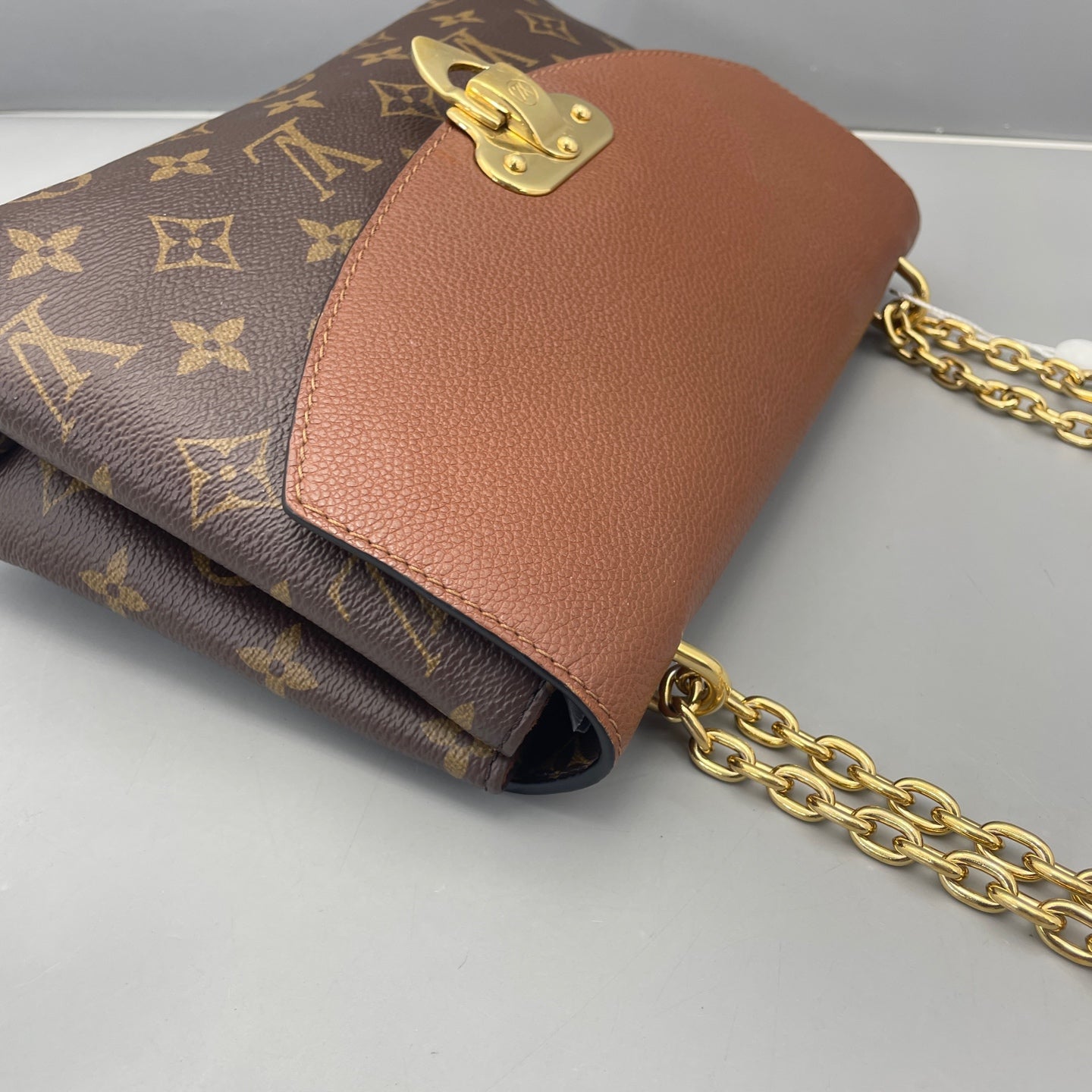 Louis Vuitton - Saint Placide - Monogram coated canvas with grained leather trim - Brown - (medium)
