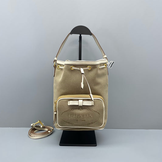 Prada - Drawstring Bucket Bag - Canvas with leather trim - Beige - (Small)