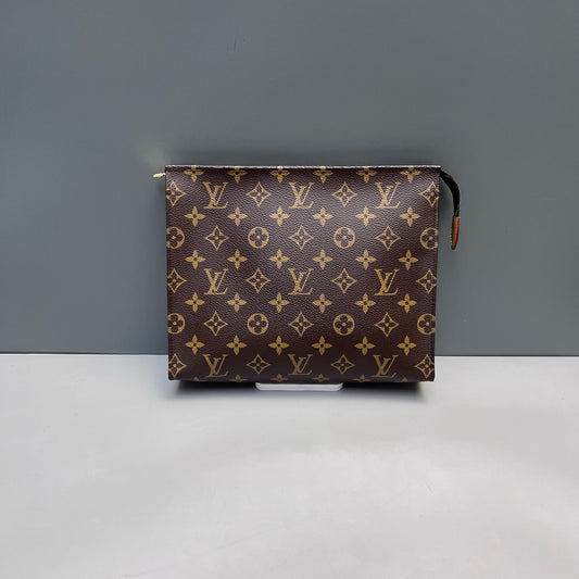 Louis Vuitton - Monogram Toiletry Pouch 26 - Monogram coated canvas with vachetta leather accents - Brown - (medium)