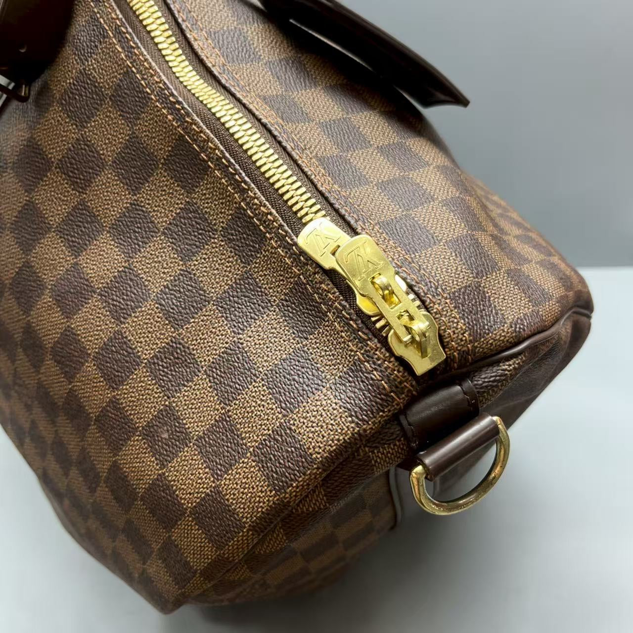 Louis Vuitton - Keepall 55 - Coated canvas with leather trim - Brown - (Large)