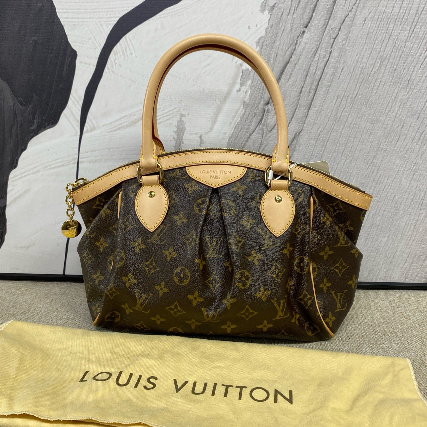 Louis Vuitton - Tivoli PM - Monogram coated canvas with Vachetta leather trim - Brown - (Medium)