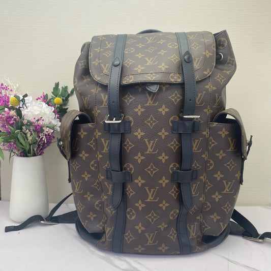 Louis Vuitton - Christopher - Monogram coated canvas with black leather trim - Brown - (large)