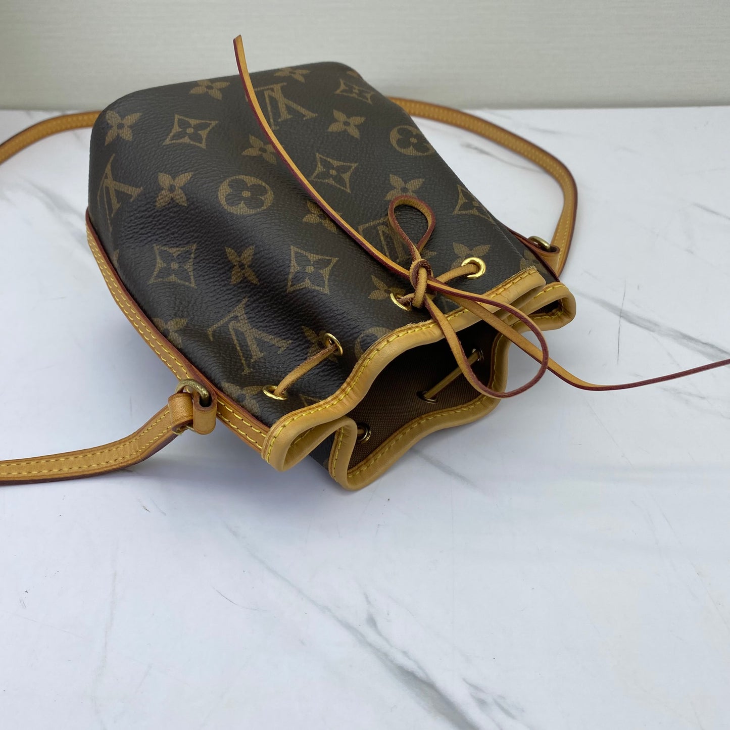 Louis Vuitton - Noe Nano - Monogram coated canvas with Vachetta leather trim - Brown - (mini)