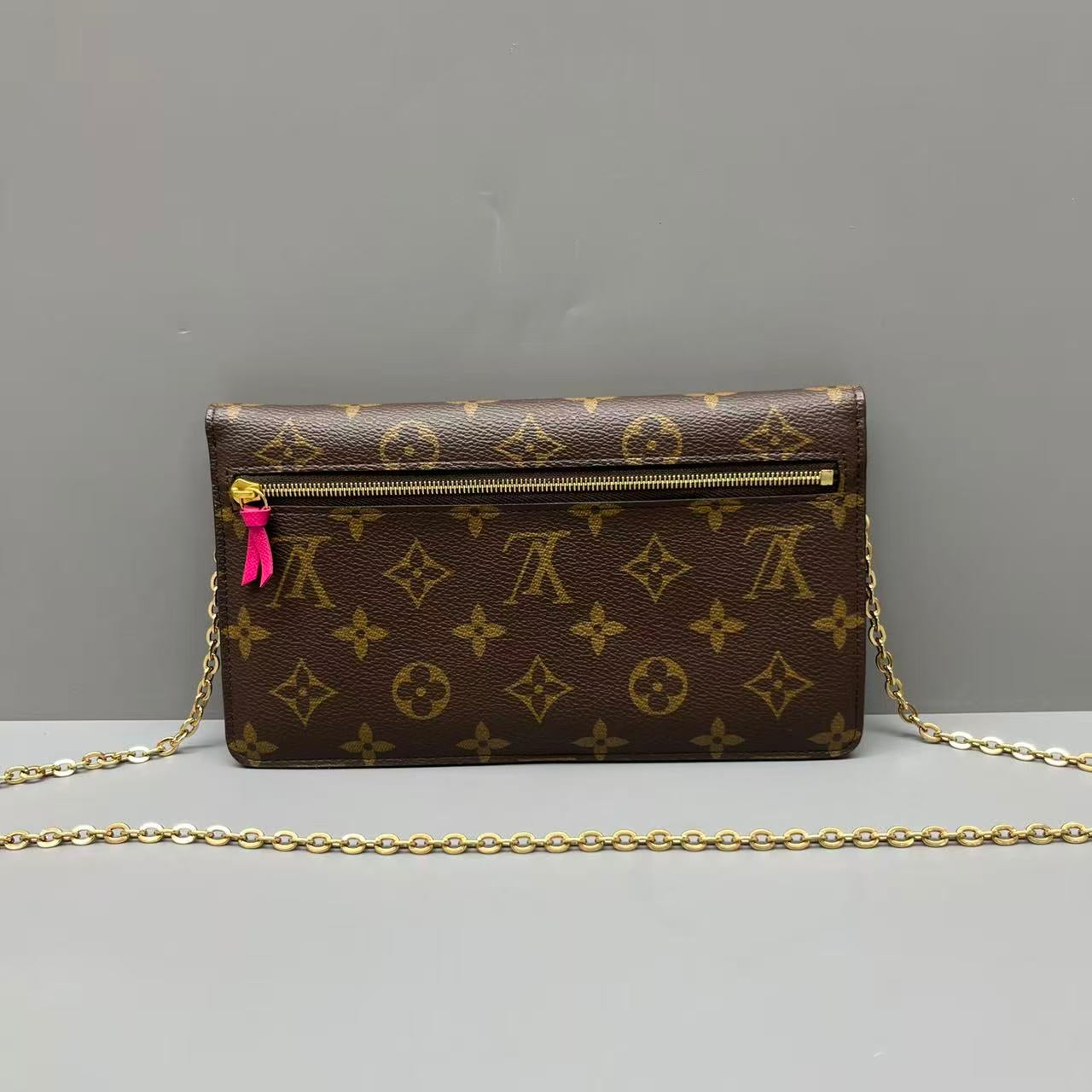 Louis Vuitton - Pochette Félicie Christmas Animation - Monogram coated canvas with leather trim - Brown with multicolour print - (mini)