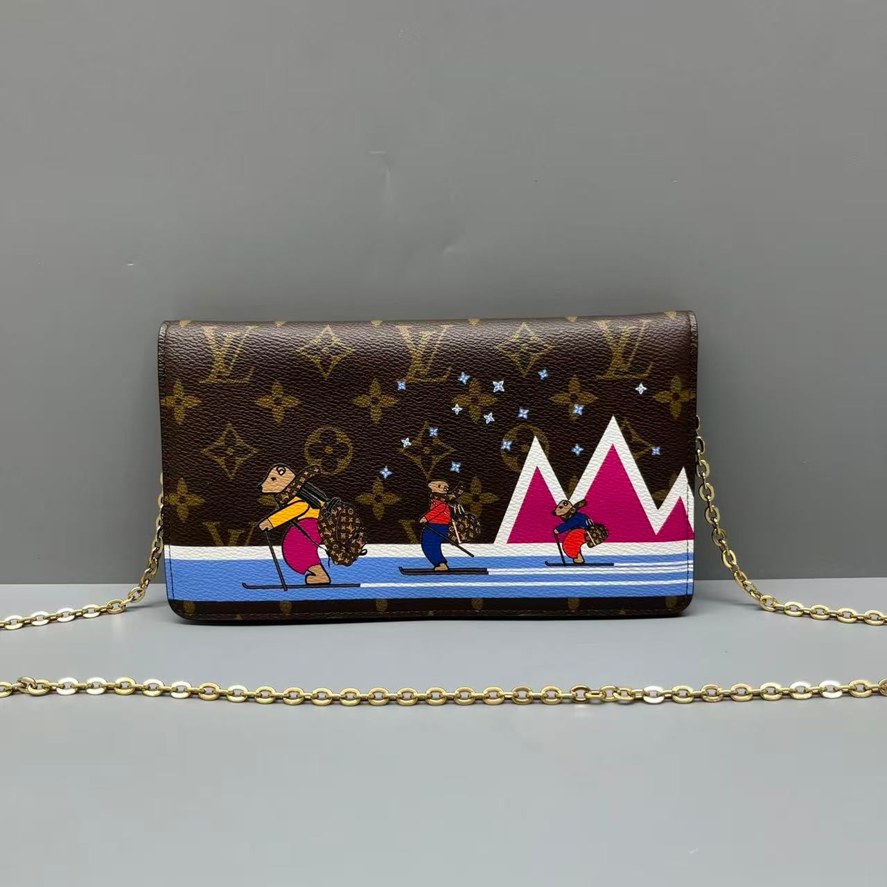 Louis Vuitton - Pochette Félicie Christmas Animation - Monogram coated canvas with leather trim - Brown with multicolour print - (mini)