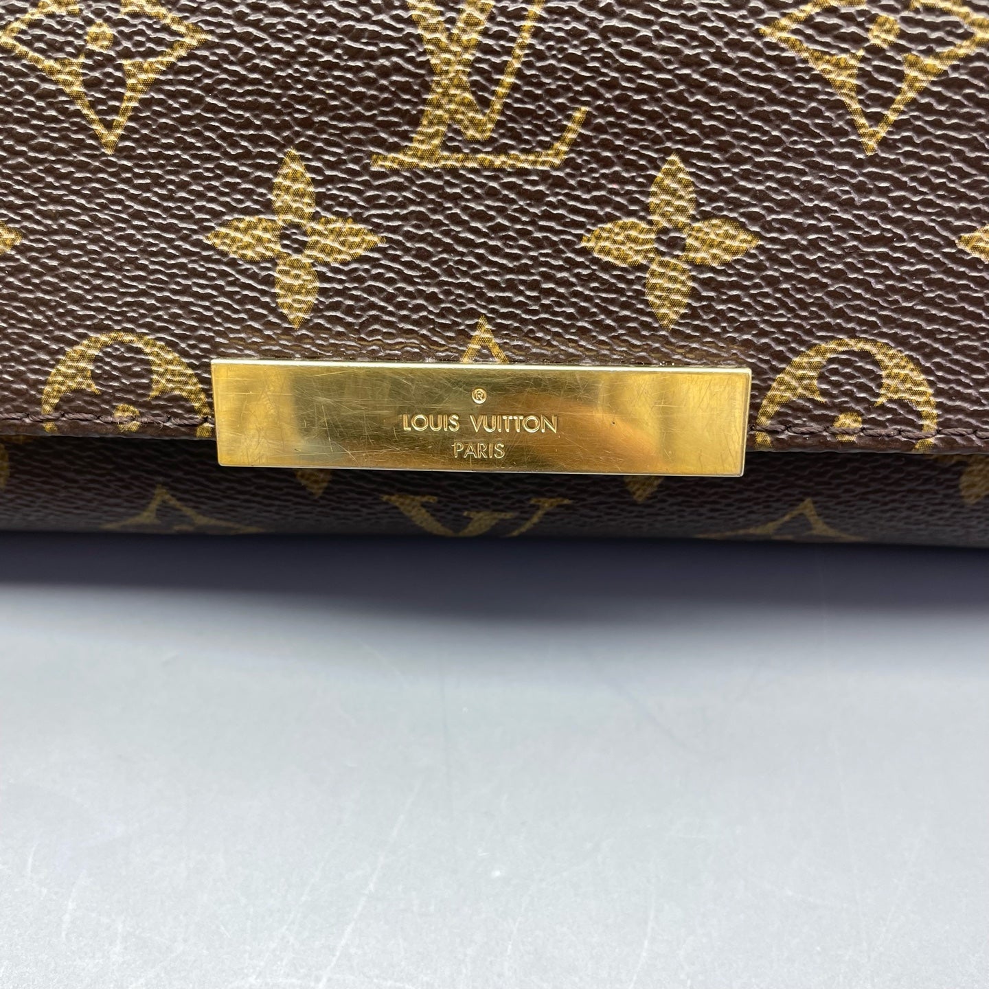 Louis Vuitton - Favorite PM - Monogram coated canvas with Vachetta leather trim - Brown - (small)