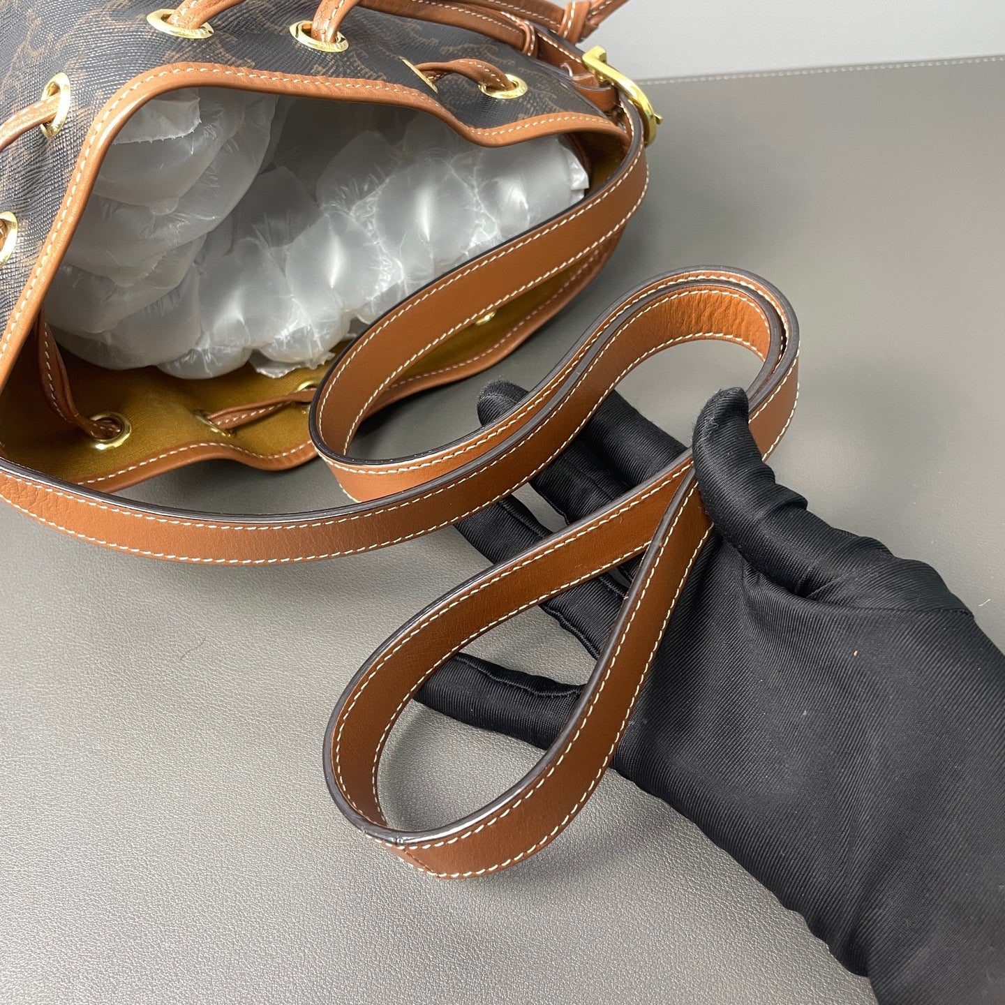 Celine - Triomphe Canvas Drawstring Bucket Bag - Triomphe coated canvas with brown leather trim - Brown - (small)