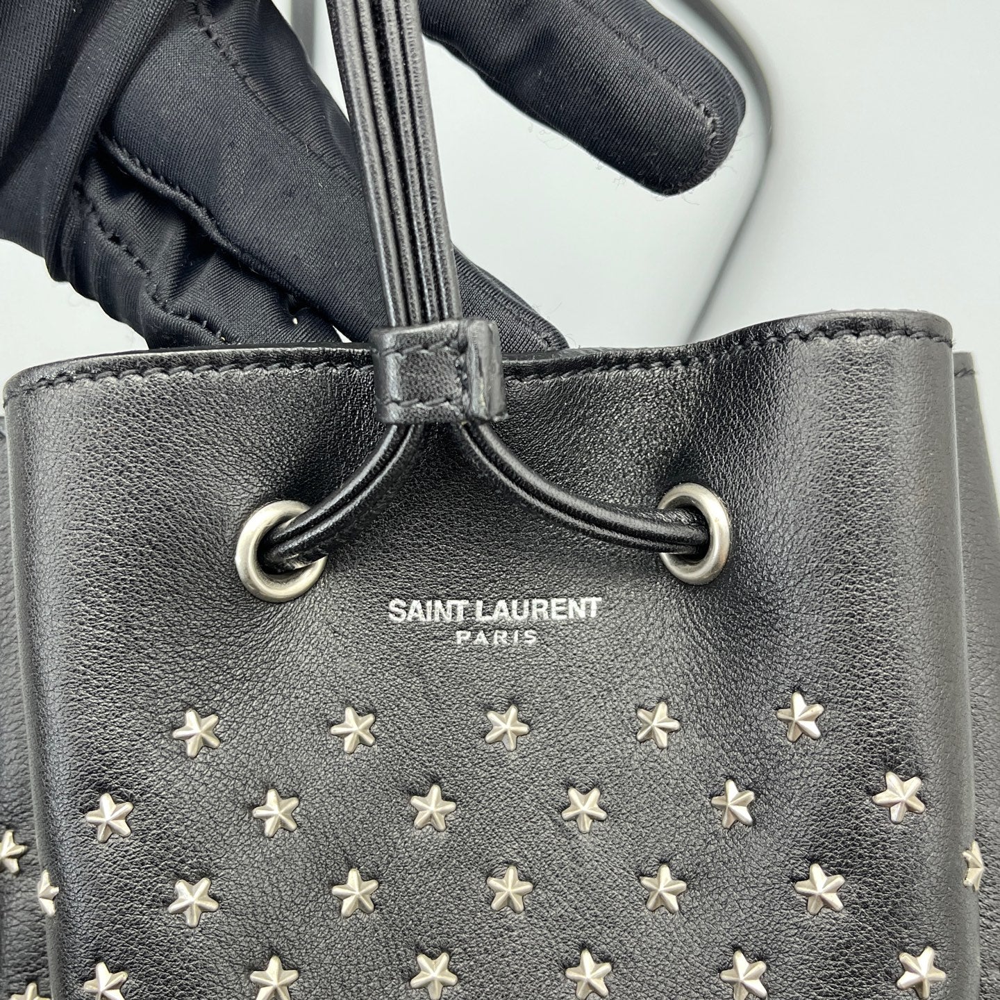 Saint Laurent - Studded Drawstring Bucket Bag - Grained leather - Black - (mini)