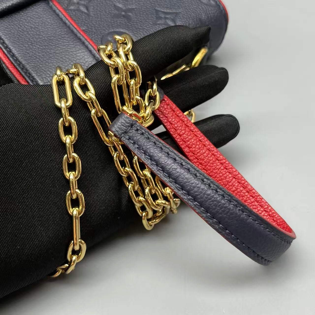 Louis Vuitton - Saint Sulpice PM - Monogram Empreinte leather - Navy with Red accents - (medium)