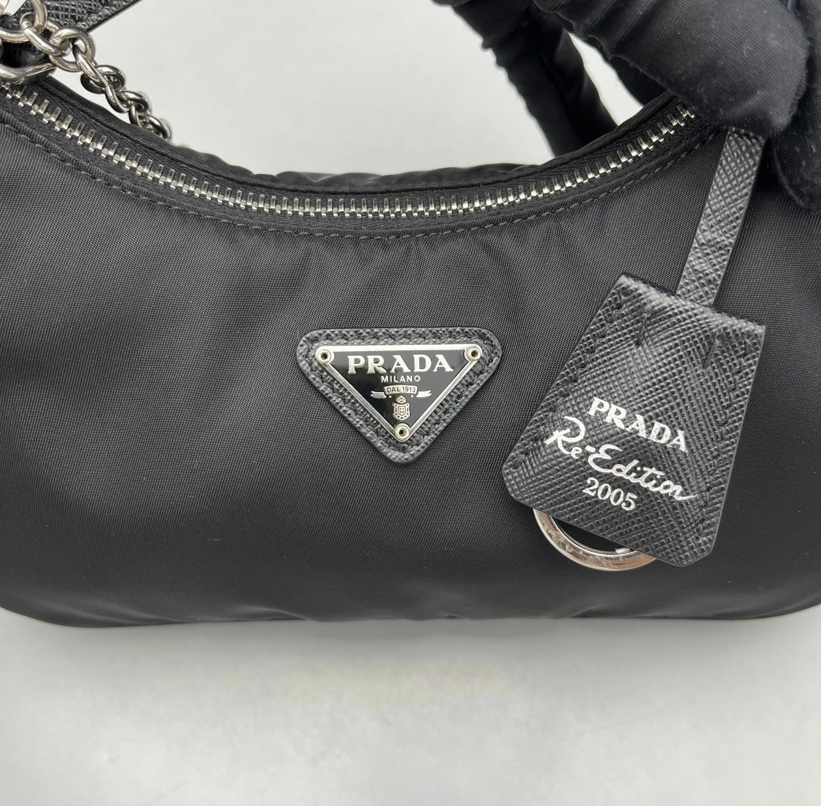 Prada - Re-Edition 2005 Re-Nylon Bag - Re-Nylon and Saffiano leather trims - Black - (small)